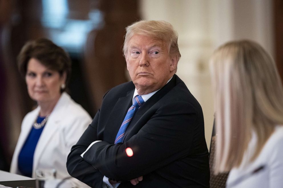 PHOTO: U.S. President Donald Trump listens during an American Workforce Policy Advisory Board meeting in the East Room of the White House in Washington, D.C., June 26, 2020.