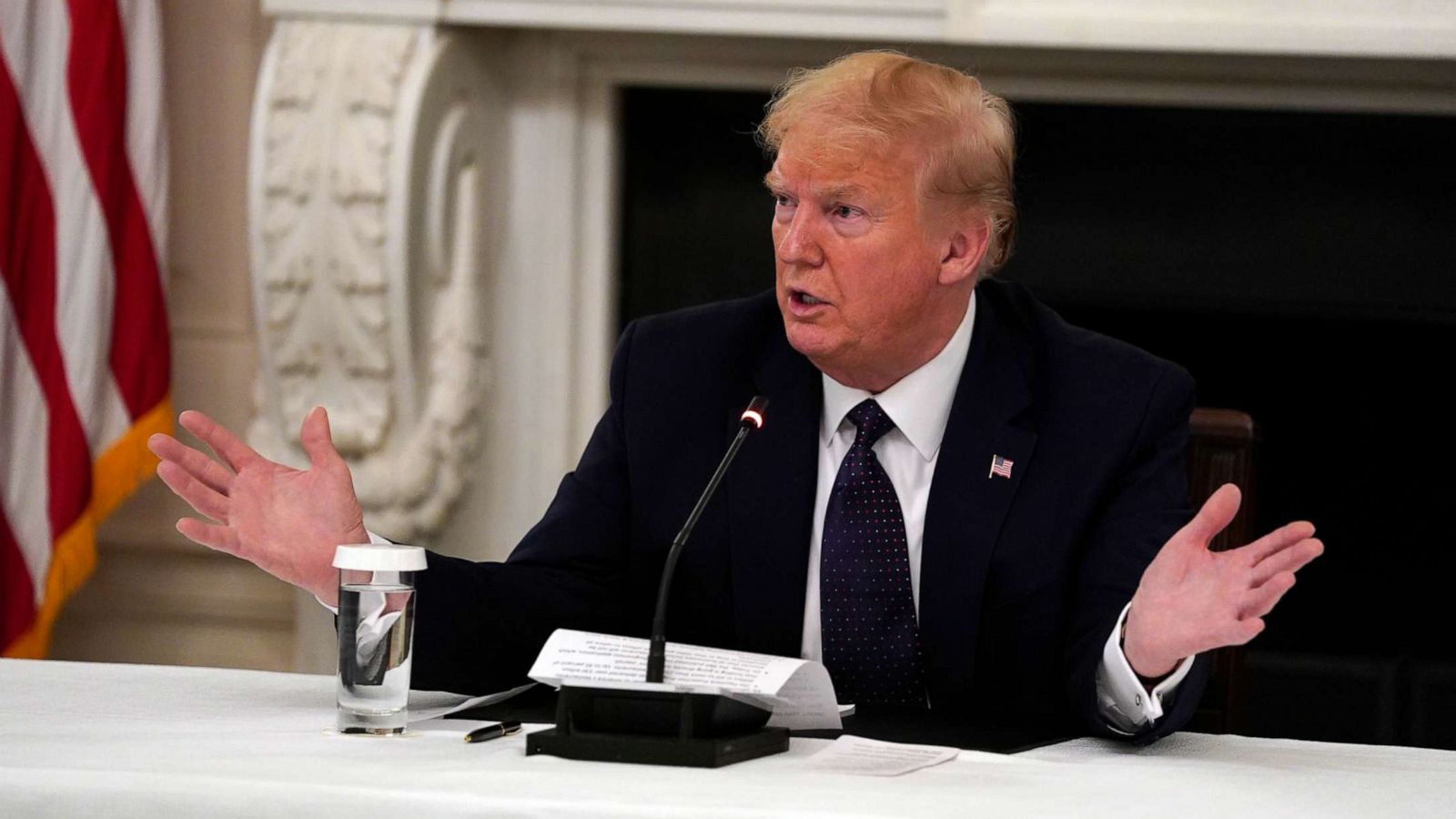 PHOTO: President Donald Trump tells reporters that he is taking zinc and hydroxychloroquine during a meeting with restaurant industry executives about the coronavirus response, in the State Dining Room of the White House, May 18, 2020, in Washington.