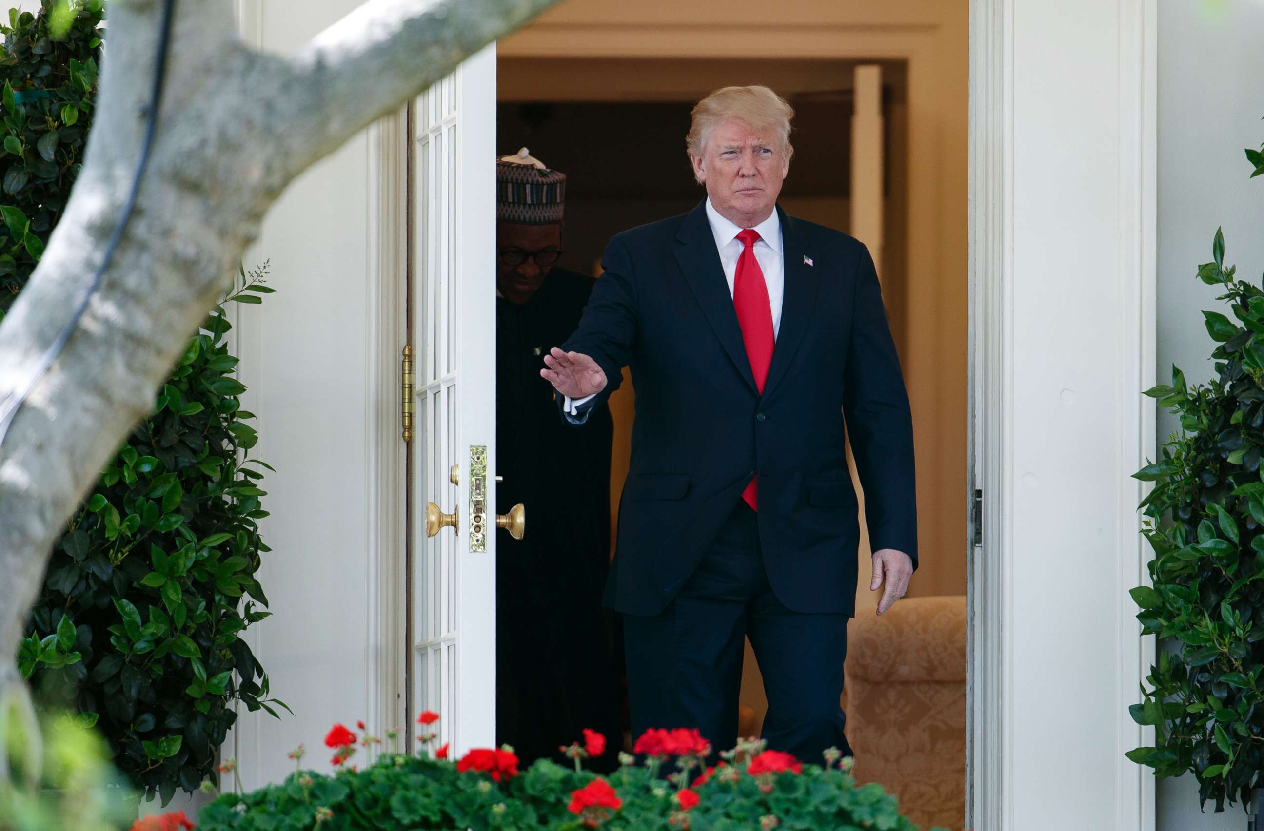 PHOTO: President Donald Trump and Nigerian President Muhammadu Buhari walk from the Oval Office before a news conference in the Rose Garden of the White House, April 30, 2018.