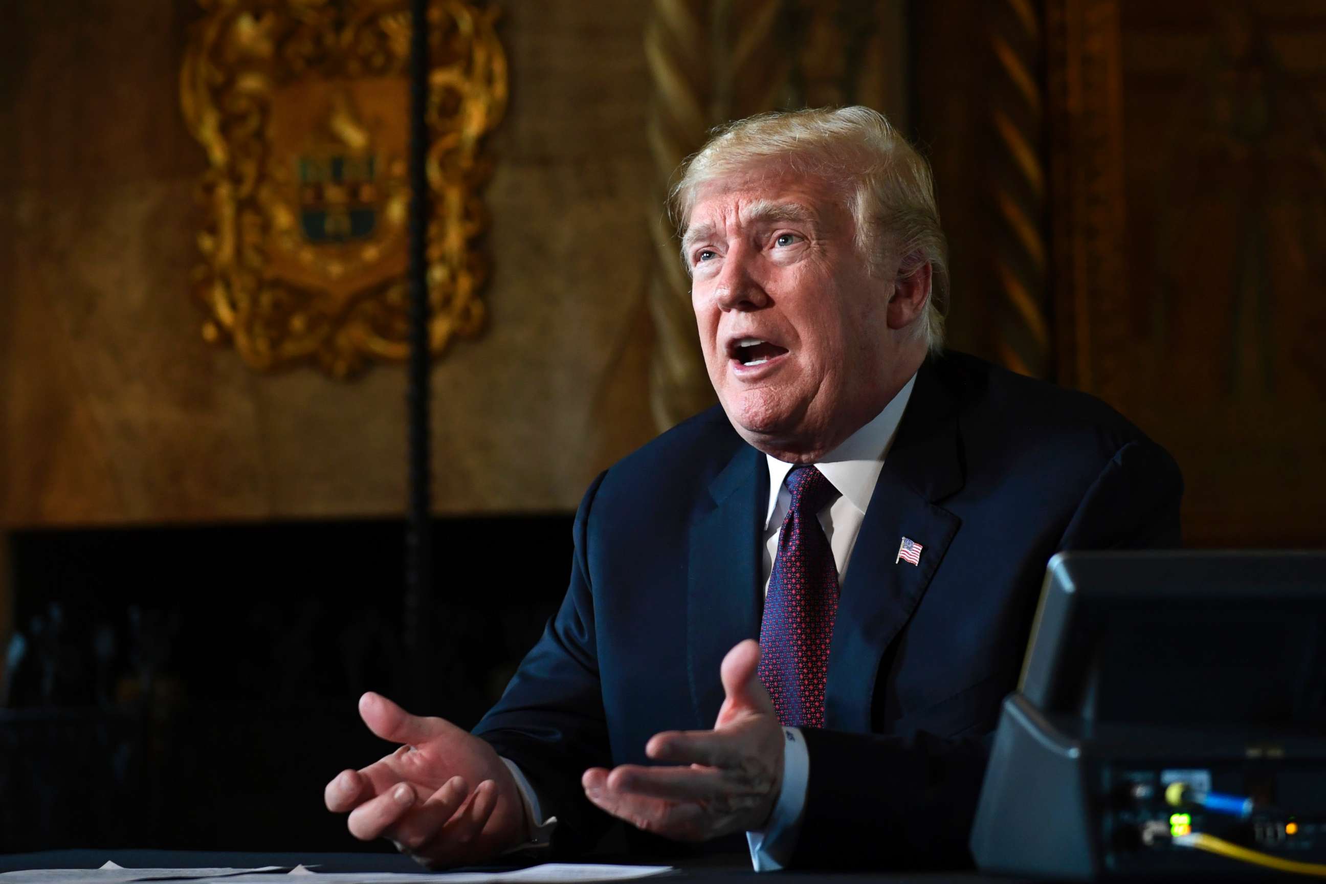 PHOTO: President Donald Trump speaks with reporters at his Mar-a-Lago estate in Palm Beach, Fla., Nov. 22, 2018.