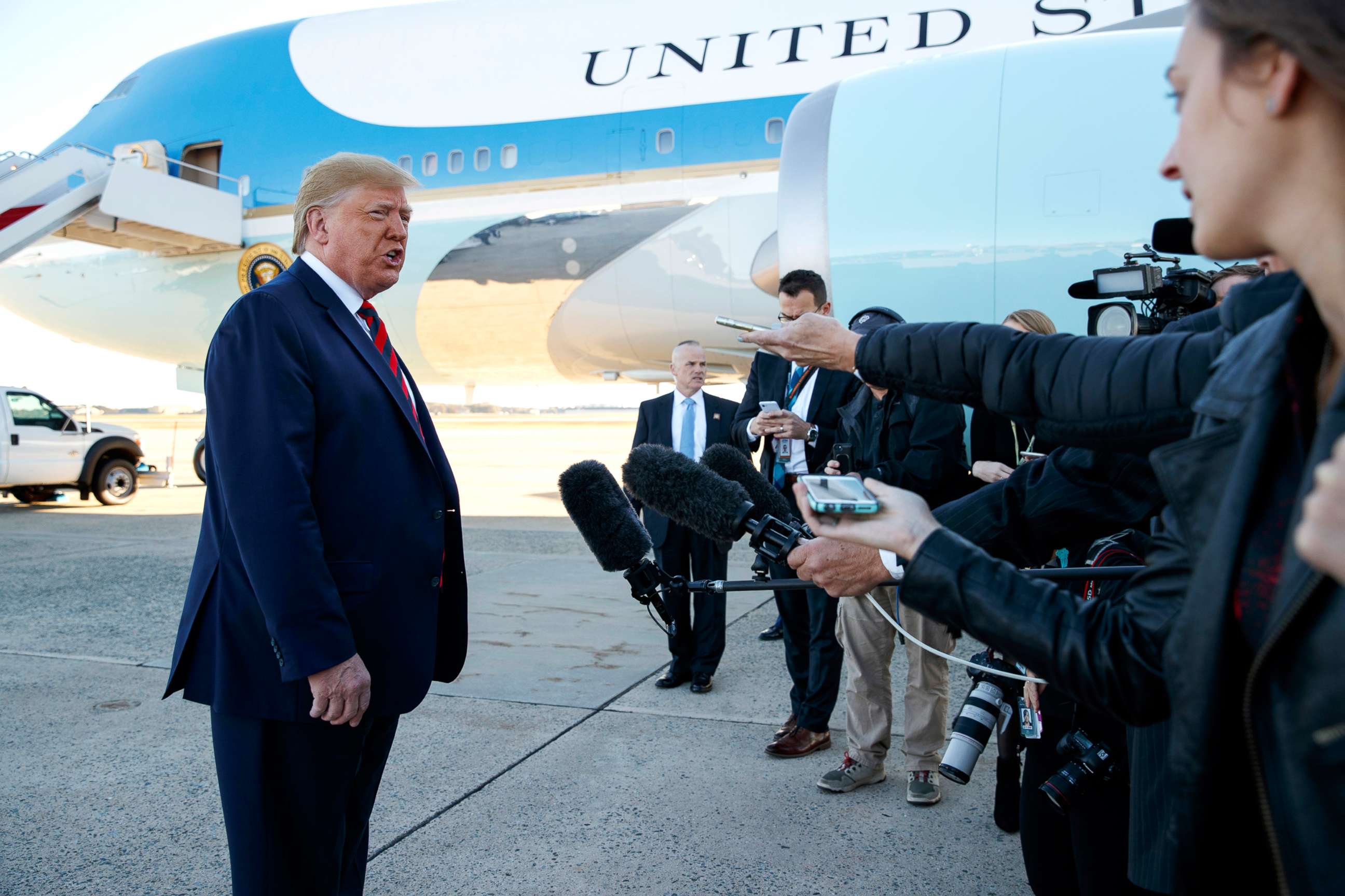 PHOTO: President Donald Trump talks to reporters before boarding Air Force One for a trip to Chicago to attend the International Association of Chiefs of Police Annual Conference and Exposition, Oct. 28, 2019, in Andrews Air Force Base, Md.