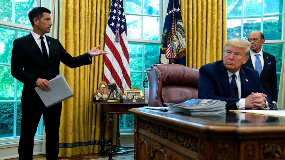 PHOTO: President Donald Trump listens as acting Secretary of Homeland Security Chad Wolf speaks during a briefing on the 2020 hurricane season in the Oval Office of the White House, May 28, 2020. 