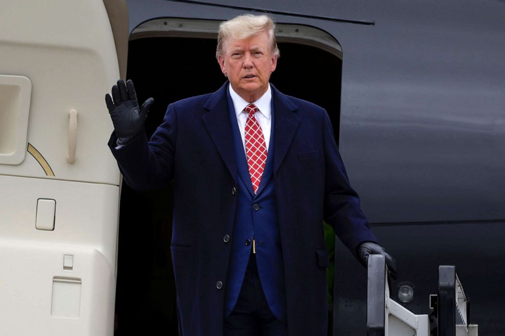 PHOTO: Former President Donald Trump disembarks his plane "Trump Force One" at Aberdeen Airport, May 1, 2023, in Aberdeen, Scotland.