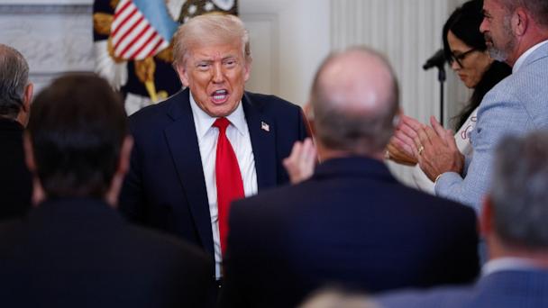 President Donald Trump greets guests after delivering remarks at a White House Faith Office luncheon in the State Dining Room at the White House, July 14, 2025.