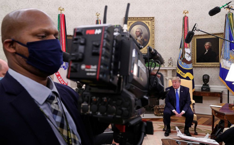 PHOTO: President Donald Trump speaks about the coronavirus disease (COVID-19) response during a meeting with Gov. Kimberly Reynolds of Iowa, in the Oval Office at the White House in Washington, May 6, 2020.