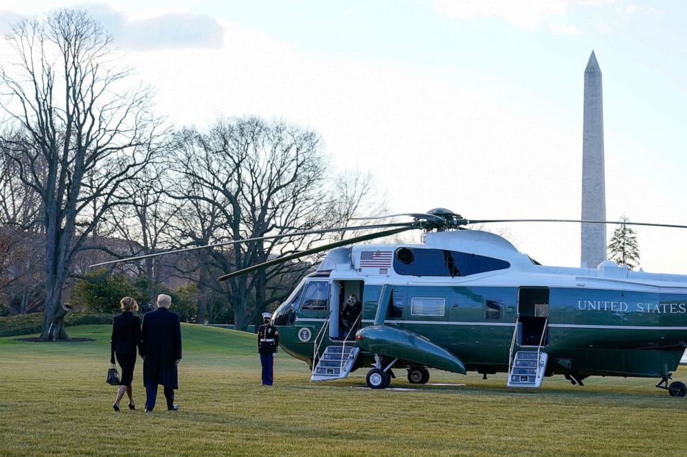 PHOTO: President Donald Trump and first lady Melania Trump walk to board Marine One on the South Lawn of the White House, Jan. 20, 2021, in Washington.