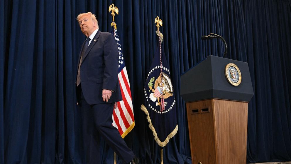 PHOTO: President Donald Trump leaves after a press conference at Trump National Doral in Miami, March 9, 2026. 