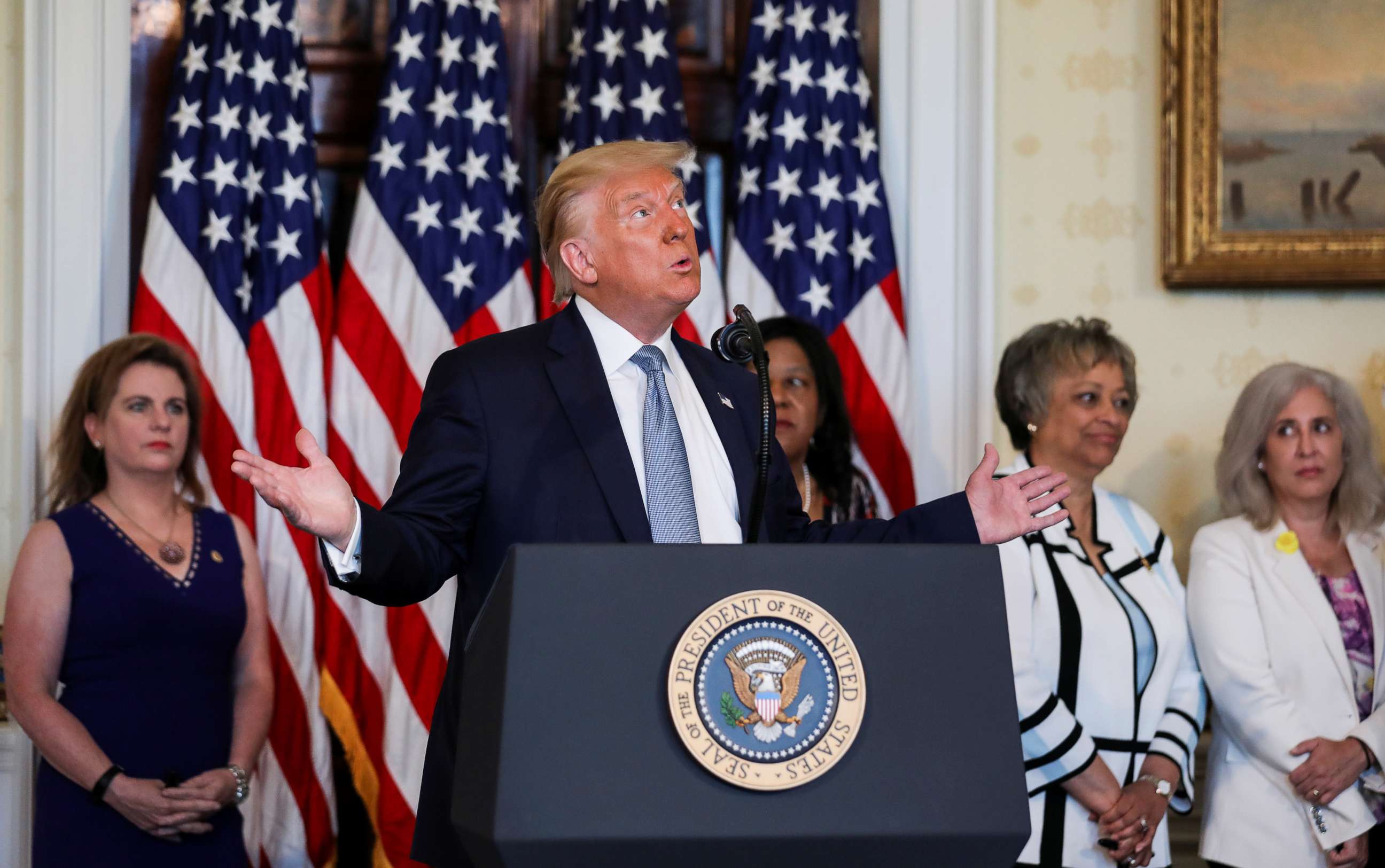 PHOTO: President Donald Trump speaks prior to signing a proclamation on the 100th anniversary of the ratification of the 19th Amendment of the U.S. Constitution during a ceremony at the White House, Aug. 18, 2020.