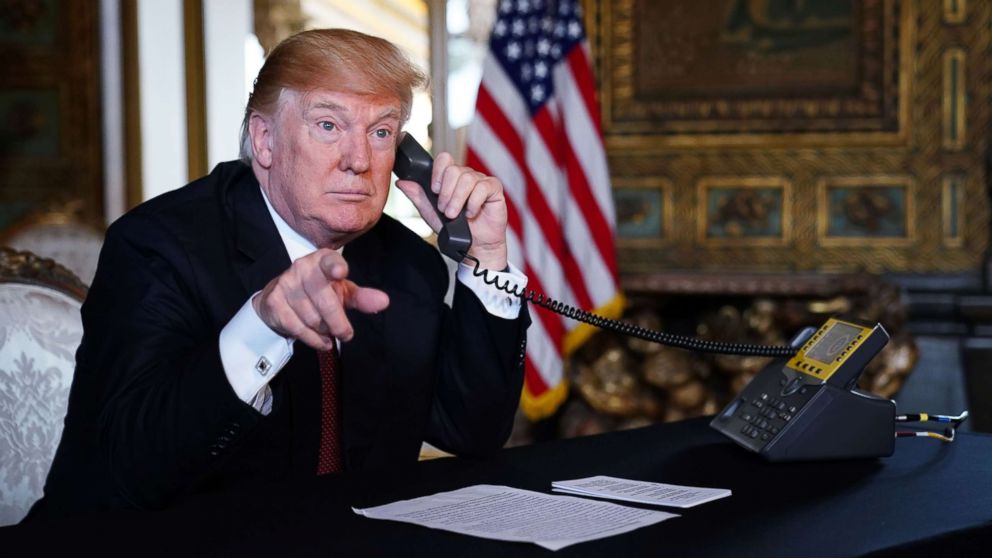 PHOTO: President Donald Trump speaks to members of the military via teleconference from his Mar-a-Lago resort in Palm Beach, Fla., on Thanksgiving Day, Nov. 22, 2018. 