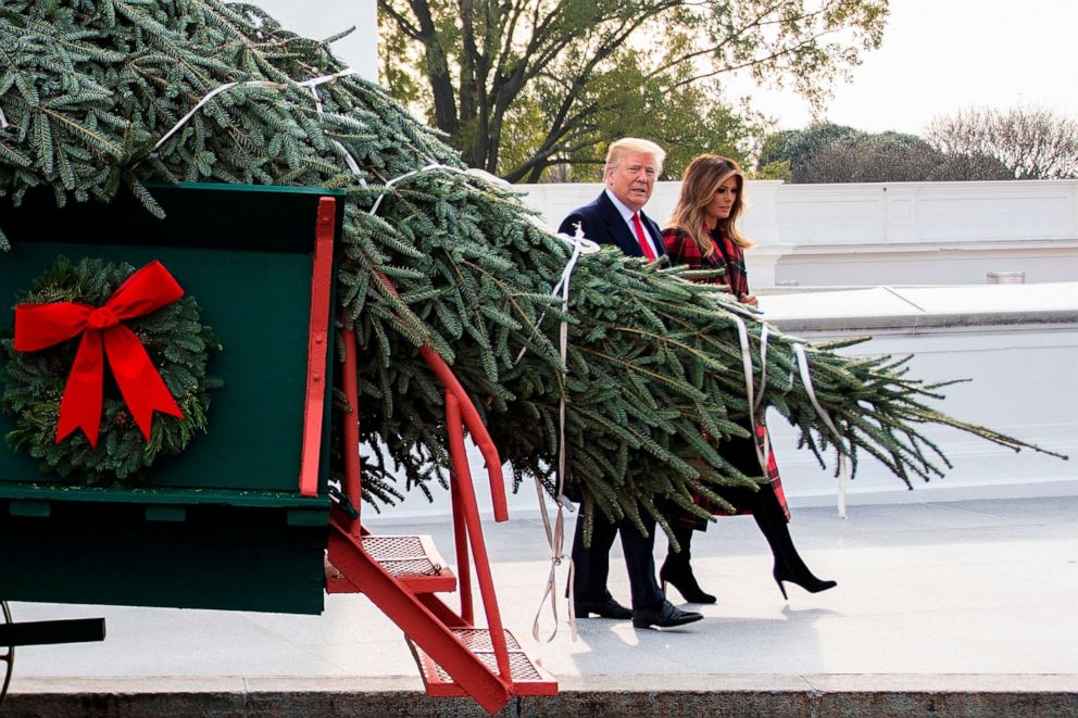 PHOTO: President Donald Trump and First Lady Melania Trump participate in the White House Christmas Tree delivery at the White House in Washington, D.C., Nov. 19, 2018. 