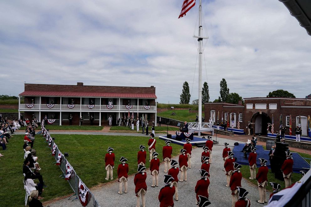 PHOTO: Members of the U.S. military dressed in 19th century uniforms listen as President Donald Trump speaks during ceremonies commemorating the Memorial Day holiday at Fort McHenry in Baltimore, May 25, 2020. 