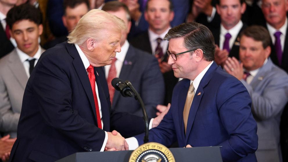PHOTO: President Donald Trump and U.S. House Speaker Mike Johnson shake hands during an event honoring the LSU baseball NCAA national champions and the LSU-Shreveport baseball NAIA national champions at the White House, Oct. 20, 2025.