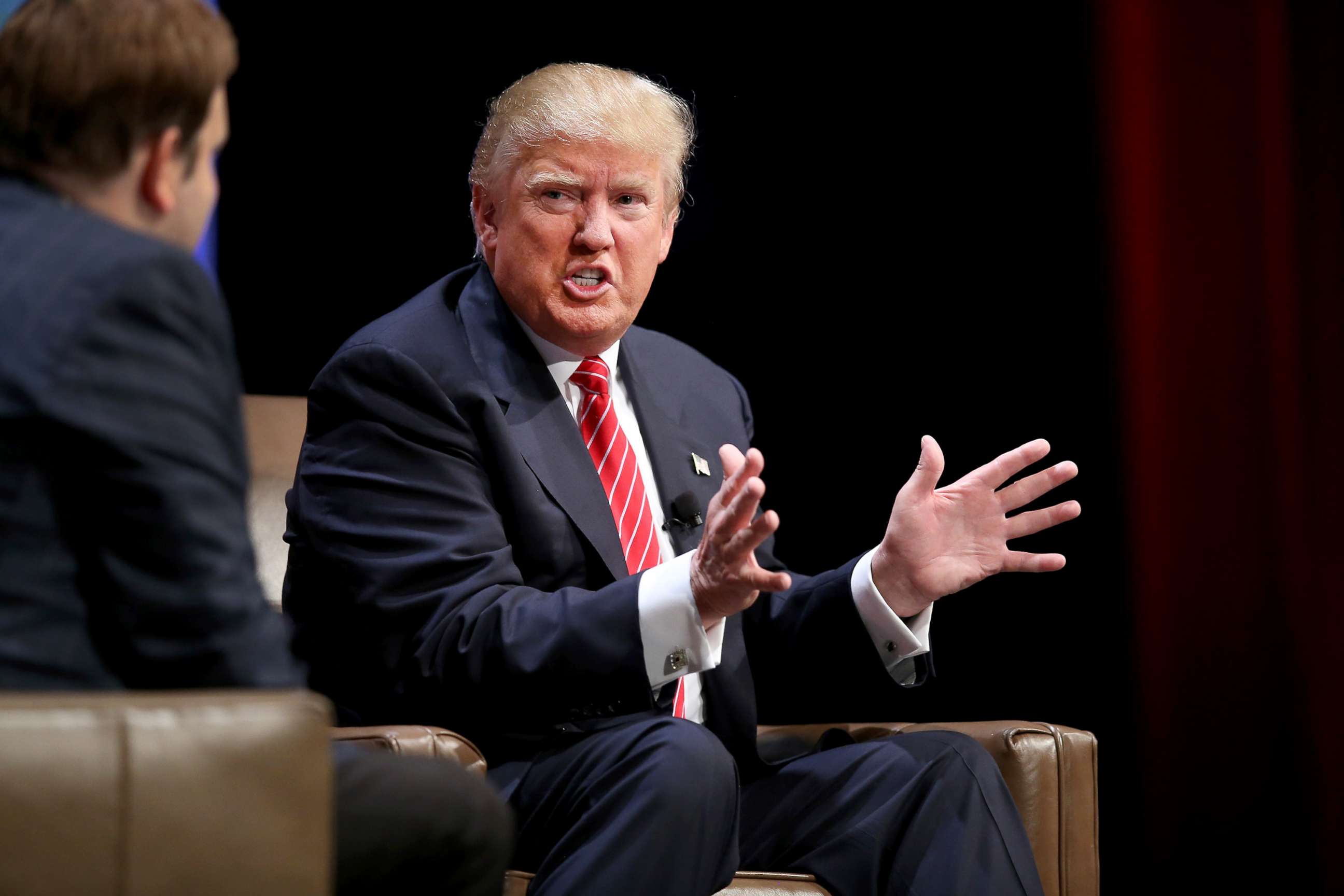 PHOTO: Republican presidential hopeful Donald Trump fields questions from Frank Luntz at the Family Leadership Summit at Stephens Auditorium, July 18, 2015, in Ames, Iowa.