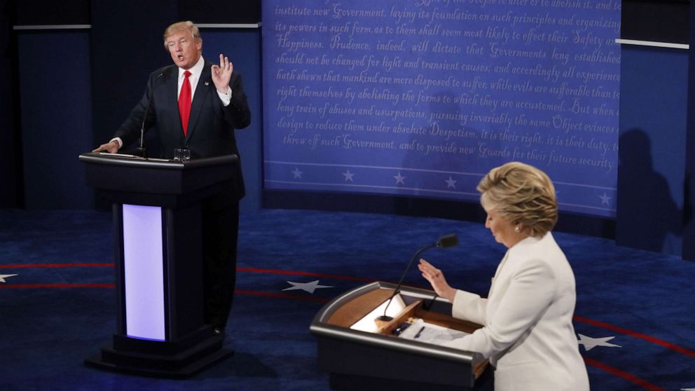 PHOTO: Democratic presidential nominee Hillary Clinton (R) and Republican presidential nominee Donald Trump speak during the final presidential debate at the Thomas & Mack Center on the campus of the University of Las Vegas in Las Vegas, October 19, 2016.