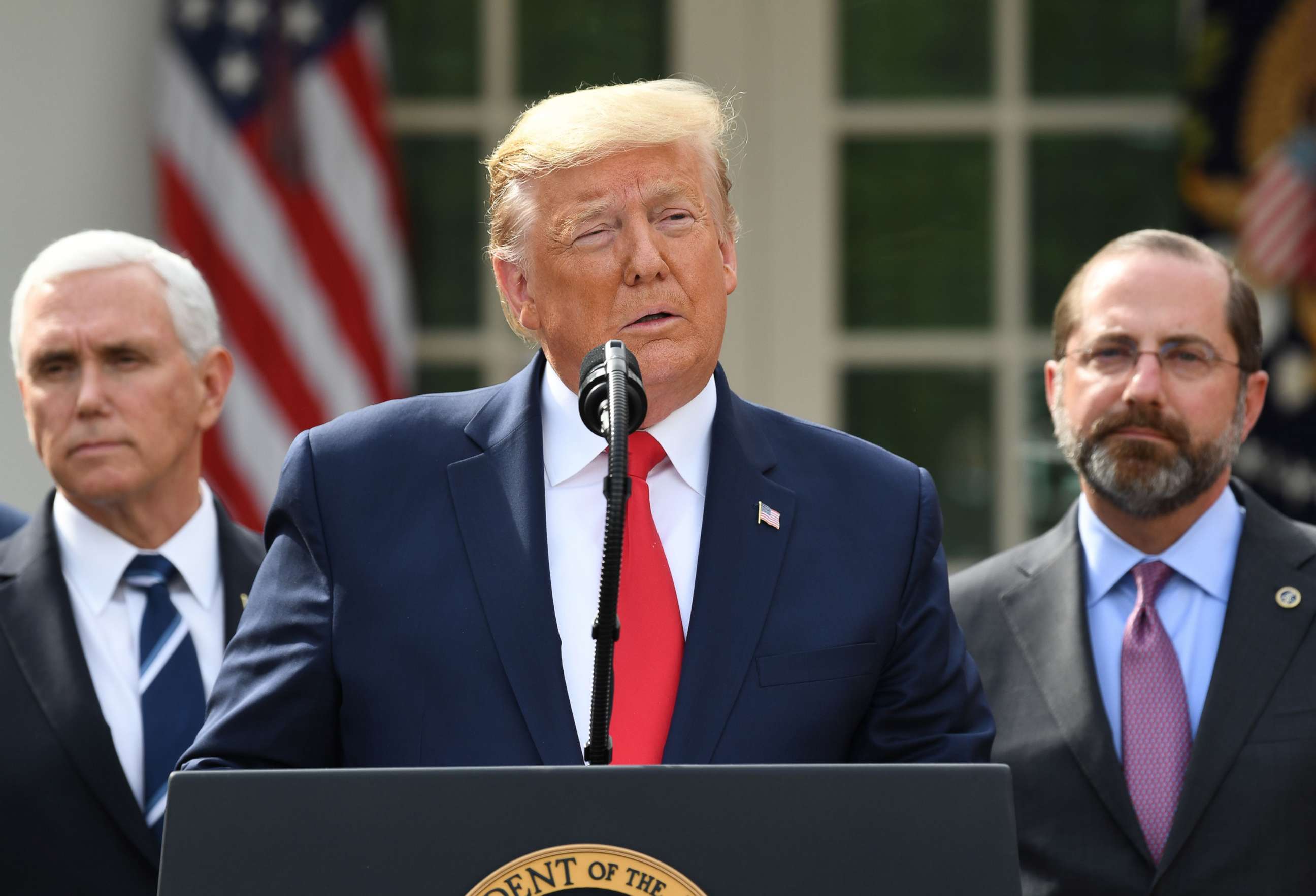 PHOTO: Surrounded by members of the White House Coronavirus Task Force, President Donald Trump speaks at a press conference on COVID-19, known as the coronavirus, in the Rose Garden of the White House in Washington,  March 13, 2020. 