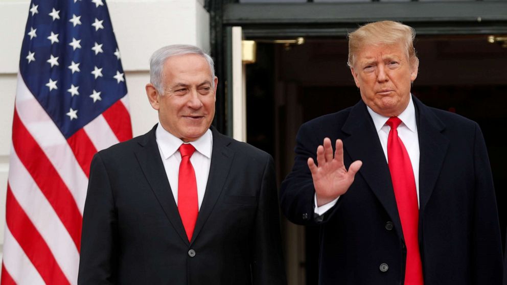 President Donald Trump gestures to gathered news media as he welcomes Israel Prime Minister Benjamin Netanyahu to the White House, March 25, 2019.