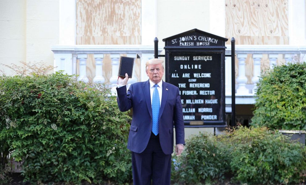 PHOTO: President Donald Trump holds up a Bible as he stands in front of St. John's Episcopal Church across from the White House during ongoing protests over racial inequality in the wake of the death of George Floyd, June 1, 2020, in Washington, D.C. 