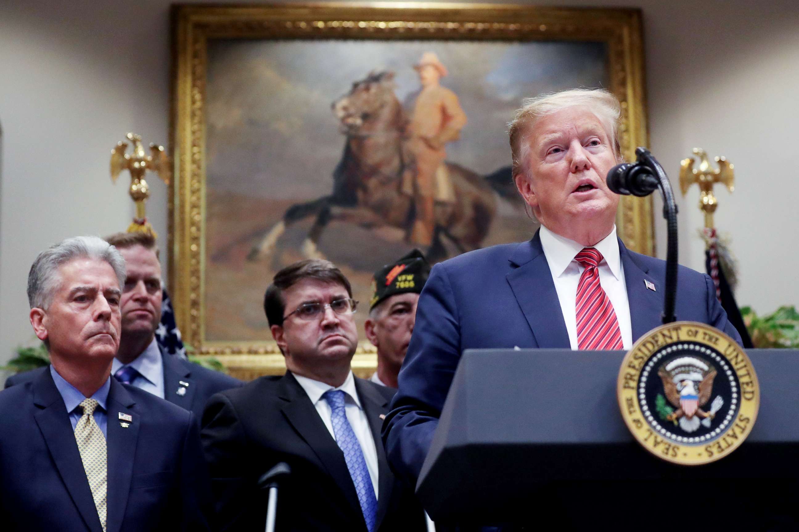 PHOTO: President Donald Trump speaks before signing an executive order on veterans suicide prevention in the Roosevelt Room at the White House, March 5, 2019.