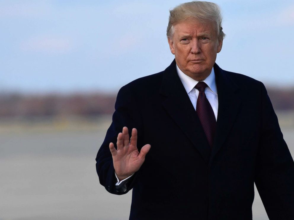 PHOTO: President Donald Trump rides the steps of Air Force One at Andrews Air Force Air Force Base in Maryland on November 20, 2018. 