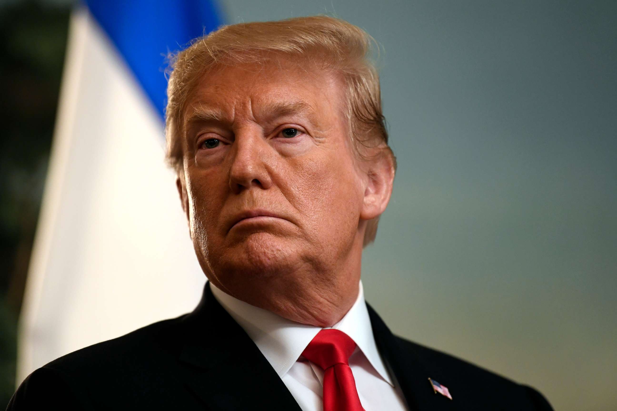 PHOTO: President Donald Trump listens in the Diplomatic Reception Room of the White House, March 25, 2019, as Israeli Prime Minister Benjamin Netanyahu speaks. 