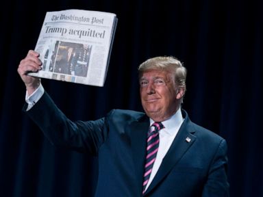 Trump brandishes 'Acquitted' headlines, lashes out at prayer breakfast