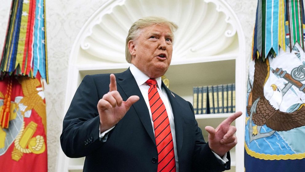 PHOTO: President Donald Trump gives pauses to answer a reporters' question about a whistleblower as he leaves the Oval Office after hosting the ceremonial swearing in of Labor Secretary Eugene Scalia at the White House, Sept. 30, 2019.