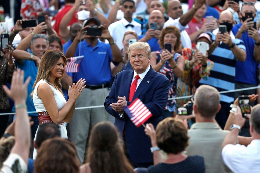 PHOTO: President Donald Trump and first lady Melania Trump greet guests at the 2020 Salute to America on the South Lawn of the White House, July 4, 2020.
