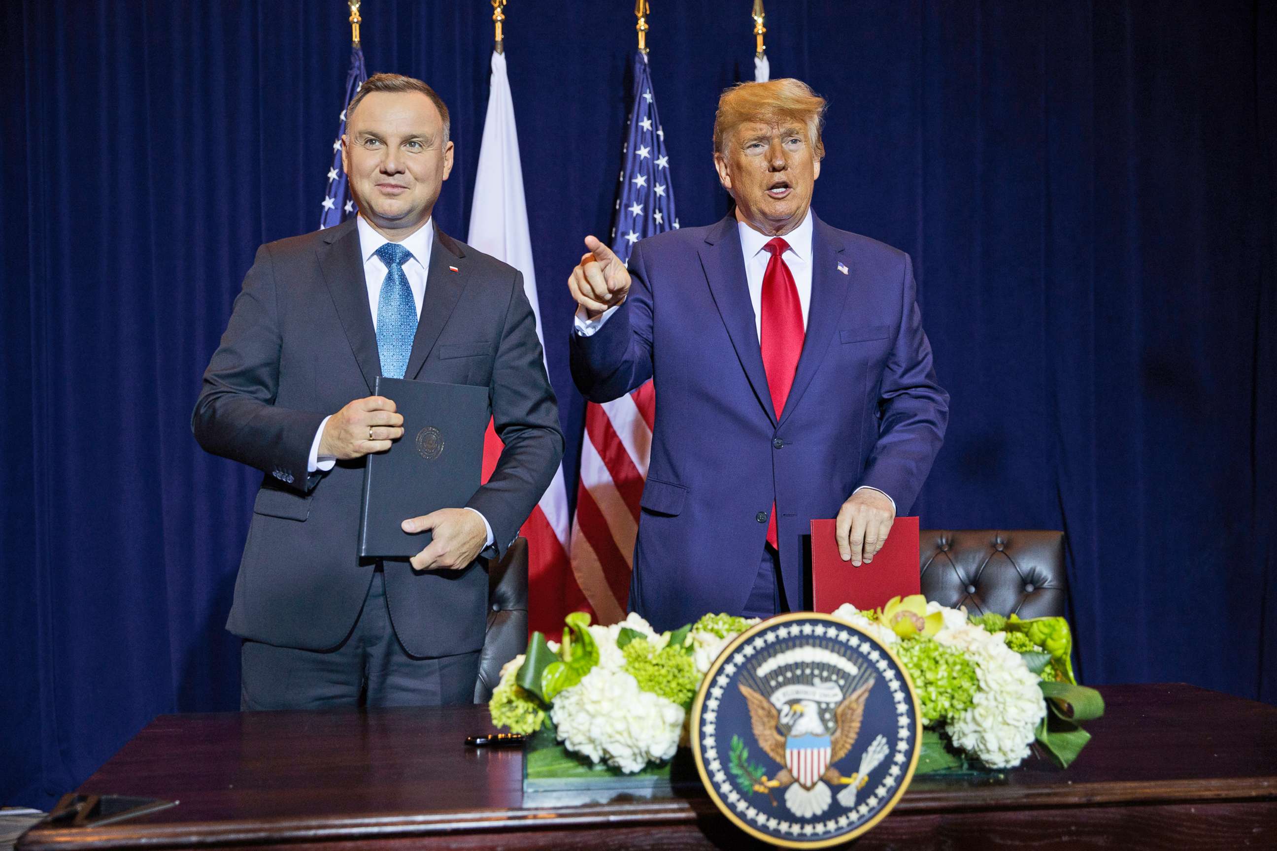 PHOTO: President Donald Trump and Polish President Andrzej Duda talk after signing a joint defense declaration agreement during the United Nations General Assembly, Sept. 23, 2019, in New York.