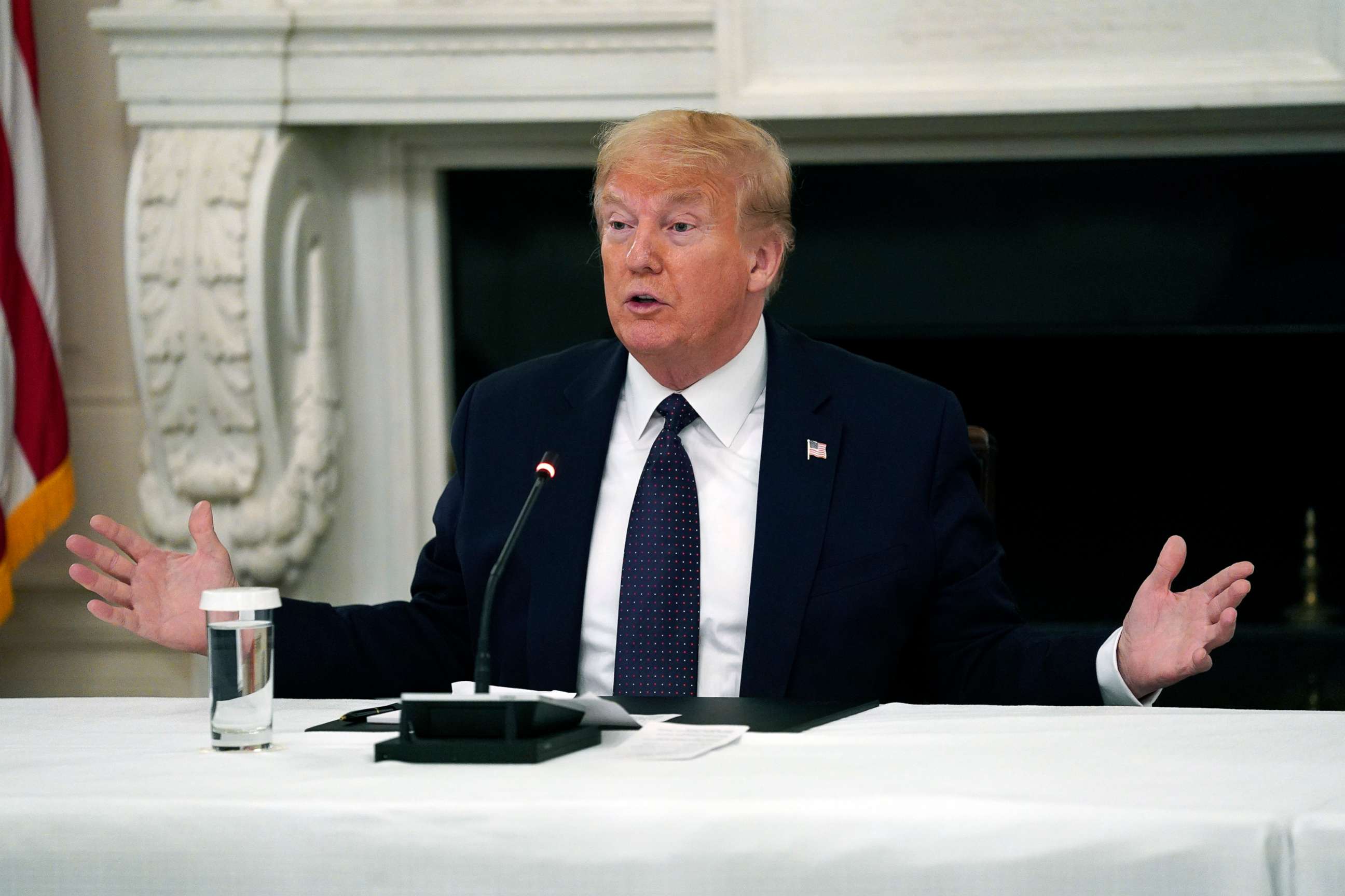 PHOTO: President Donald Trump speaks during a meeting with restaurant industry executives about the coronavirus response, in the State Dining Room of the White House, May 18, 2020.