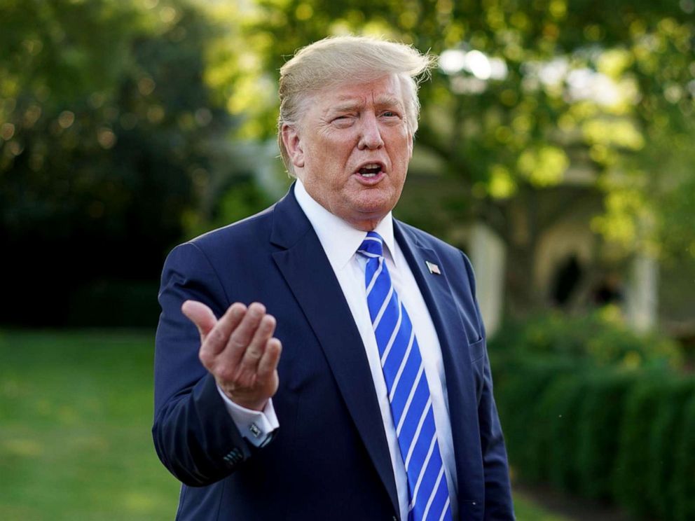 PHOTO: President Donald Trump speaks to the media before boarding Marine One to depart from the South Lawn of the White House for Camp David, Aug. 30, 2019.