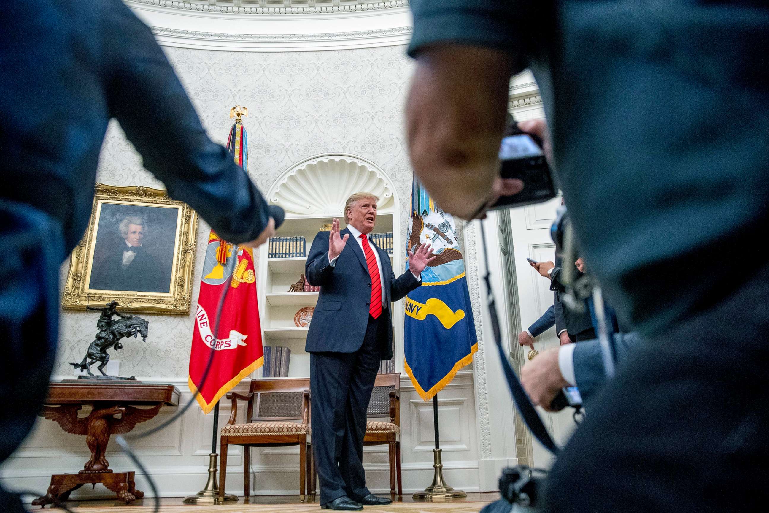 PHOTO: President Donald Trump speaks to member of the media as he departs a ceremonial swearing in ceremony for new Labor Secretary Eugene Scalia in the Oval Office of the White House, Sept. 30, 2019. 