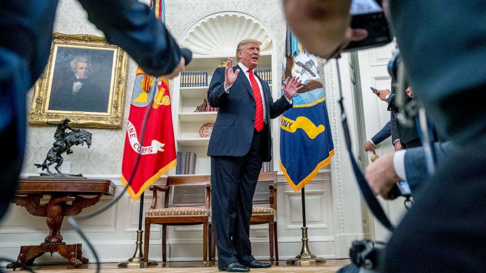 PHOTO: President Donald Trump speaks to member of the media as he departs a ceremonial swearing in ceremony for new Labor Secretary Eugene Scalia in the Oval Office of the White House, Sept. 30, 2019. 