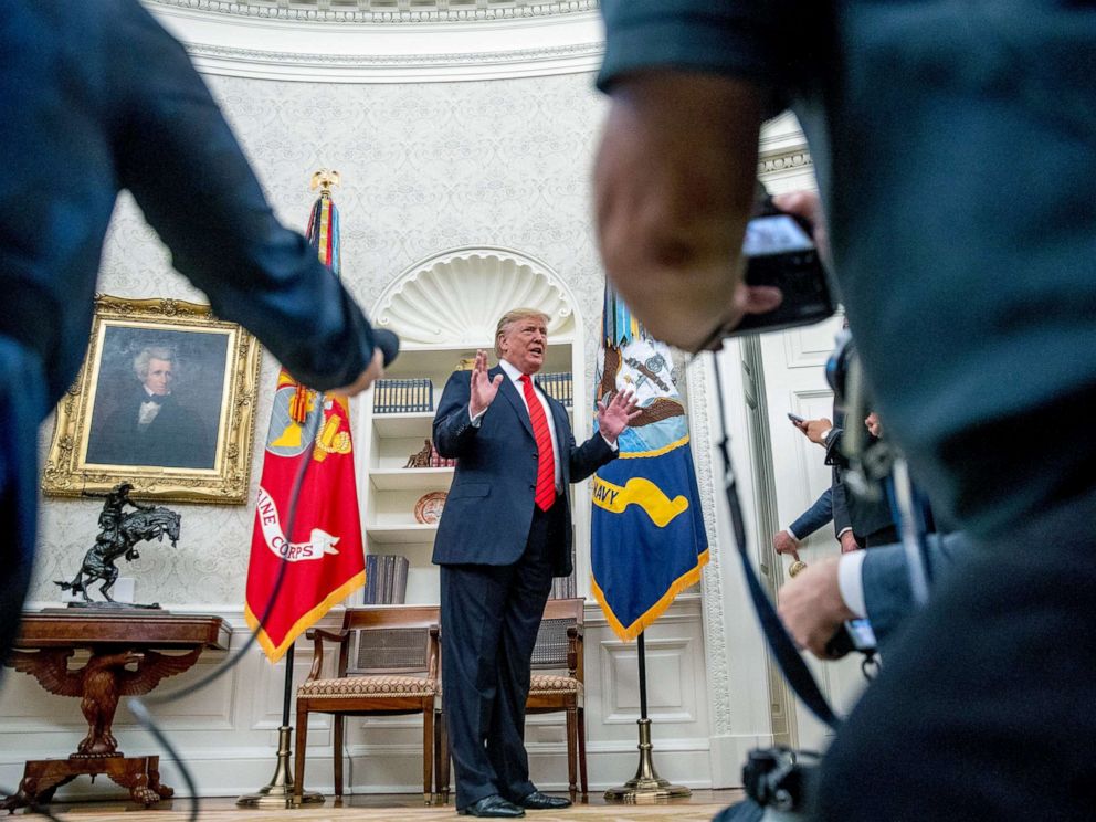 PHOTO: President Donald Trump speaks to member of the media as he departs a ceremonial swearing in ceremony for new Labor Secretary Eugene Scalia in the Oval Office of the White House, Sept. 30, 2019.