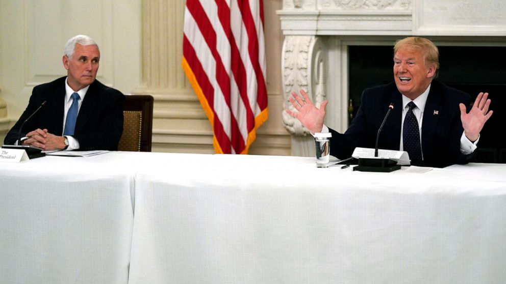 PHOTO: President Donald Trump tells reporters that he is taking zinc and hydroxychloroquine during a meeting with restaurant industry executives about the coronavirus response, in the State Dining Room of the White House, May 18, 2020.