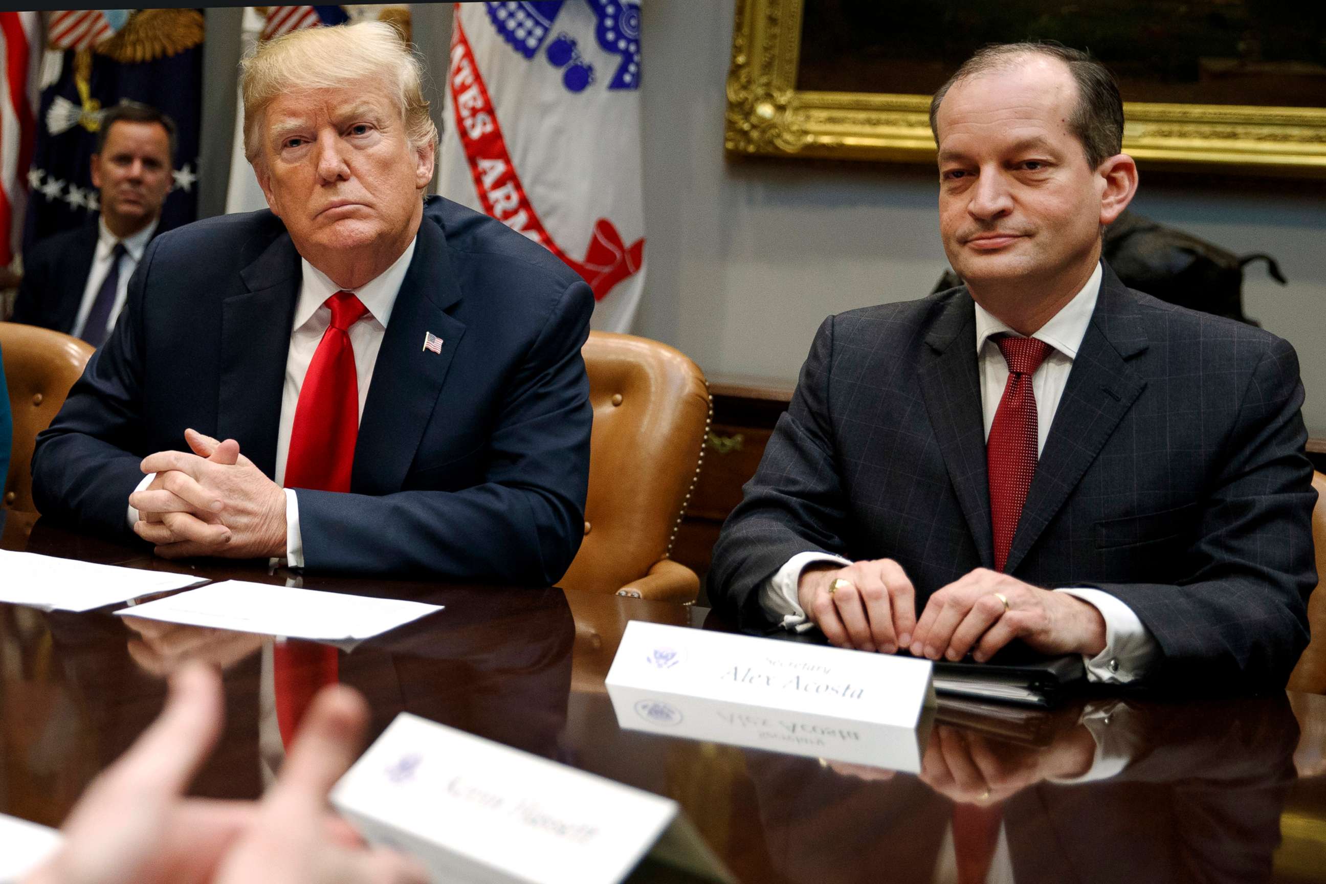 PHOTO: In this Sept. 17, 2018, file photo, President Donald Trump and Labor Secretary Alexander Acosta listen during a meeting at the White House in Washington. 