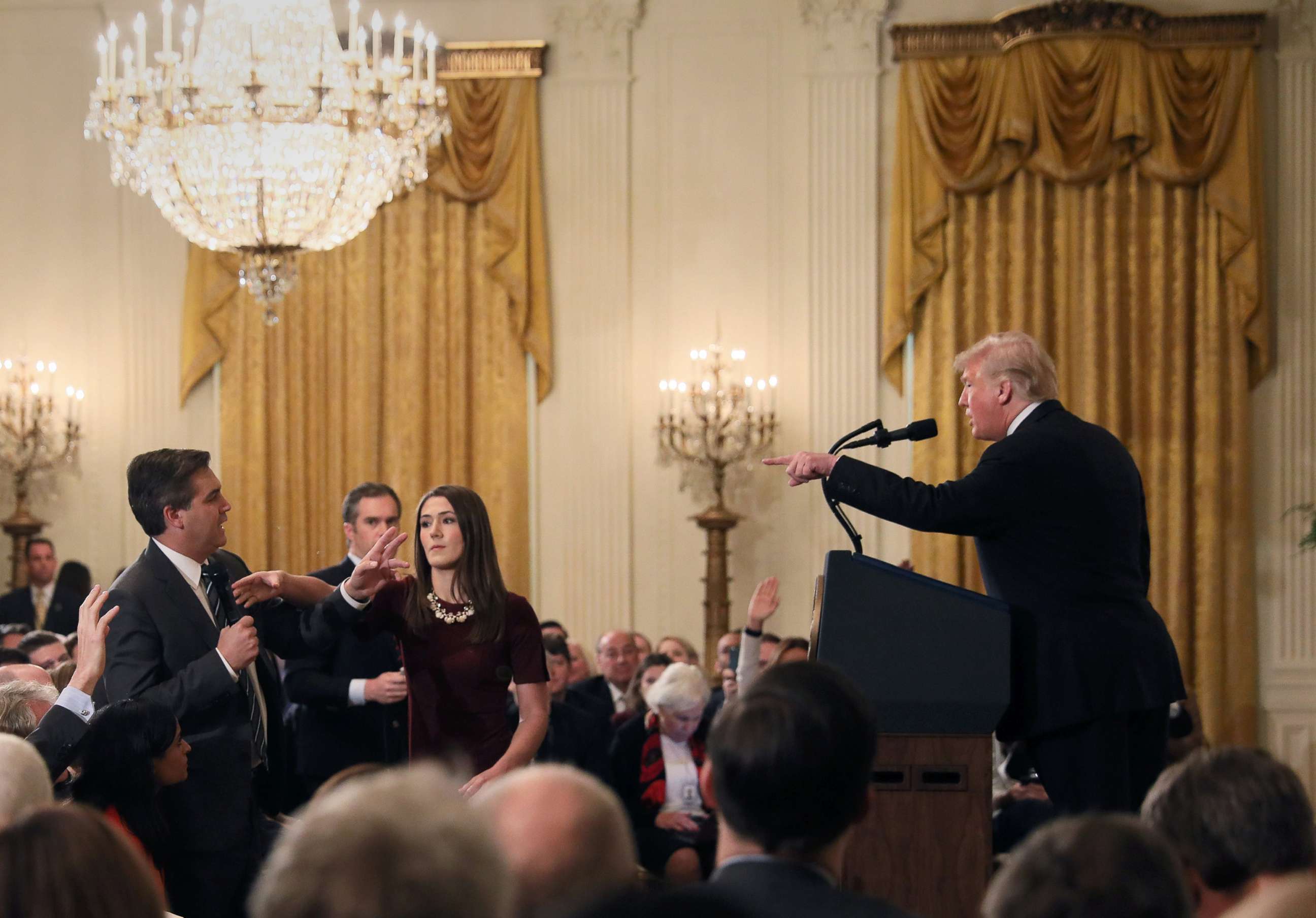 PHOTO: A White House staff member reaches for the microphone held by CNN's Jim Acosta as he questions President Donald Trump during a news conference following Tuesday's midterm elections at the White House in Washington, Nov. 7, 2018.