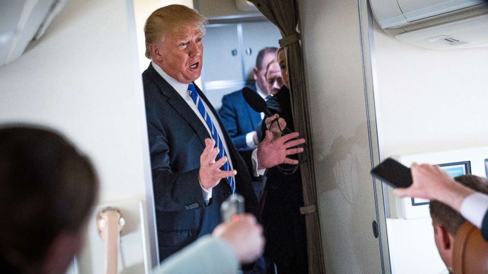 PHOTO: President Donald Trump denied knowledge about the payment by his personal lawyer Michael Cohen to porn film actress Stephanie Clifford, also known as Stormy Daniels, while speaking with reporters aboard Air Force One on April 5, 2018. 
