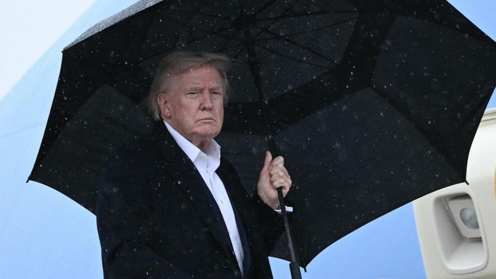 PHOTO: President Donald Trump boards Air Force One before departing from Joint Base Andrews in Maryland, on April 11, 2025.