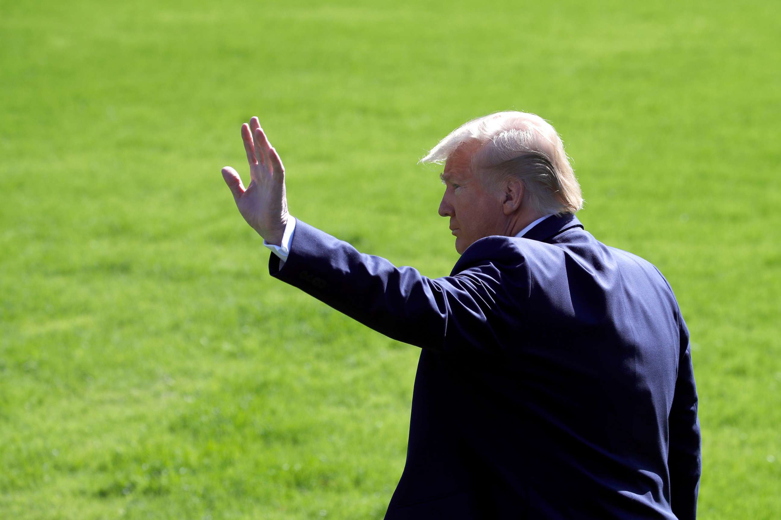 PHOTO: President Donald Trump waves as he walks to board Marine One on the South Lawn of the White House before departing, Oct. 23, 2019, in Washington.
