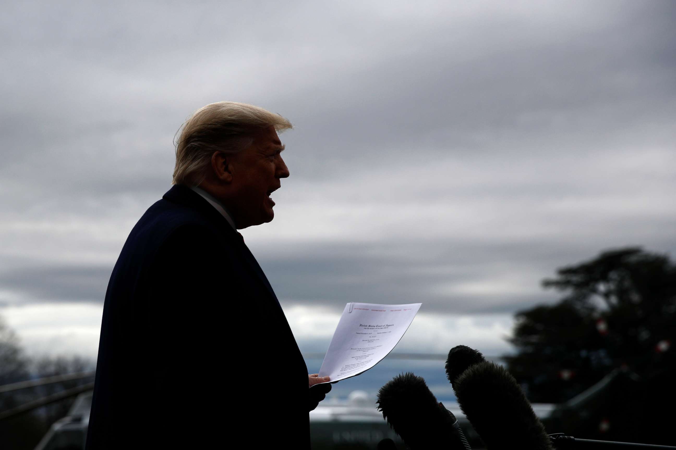 PHOTO: President Donald Trump speaks to members of the media on the South Lawn of the White House in Washington, Feb. 7, 2020, before boarding Marine One for a short trip to Andrews Air Force Base, Md., and then on to Charlotte, N.C.