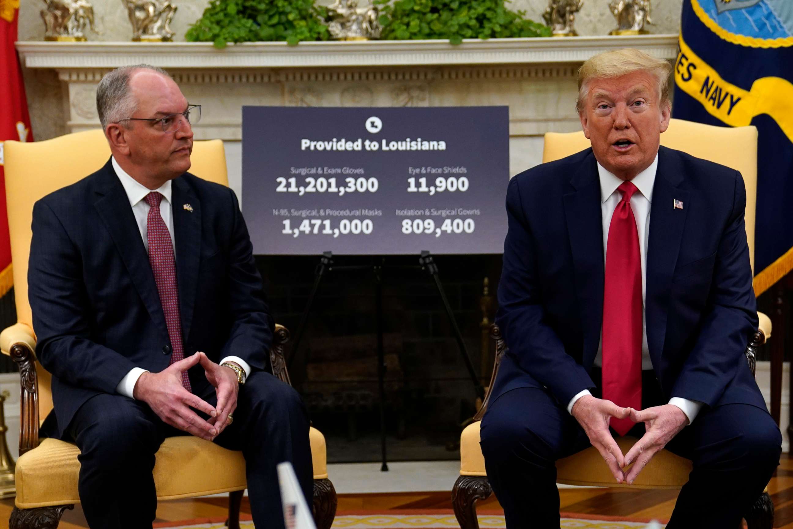 PHOTO: President Donald Trump speaks during a meeting about the coronavirus with Louisiana Gov. John Bel Edwards, left, in the Oval Office of the White House, April 29, 2020, in Washington. 