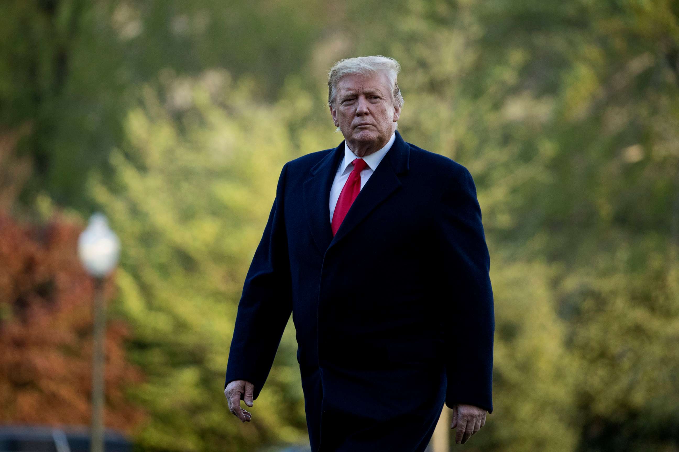 PHOTO:President Donald Trump walks on the South Lawn as he arrives at the White House in Washington, April 15, 2019.