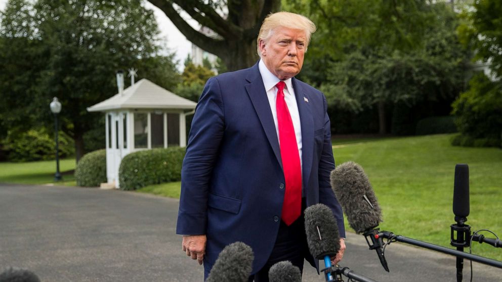 President Donald Trump listens to a question as he speaks with reporters on the South Lawn of the White House before departing, July 17, 2019, in Washington.