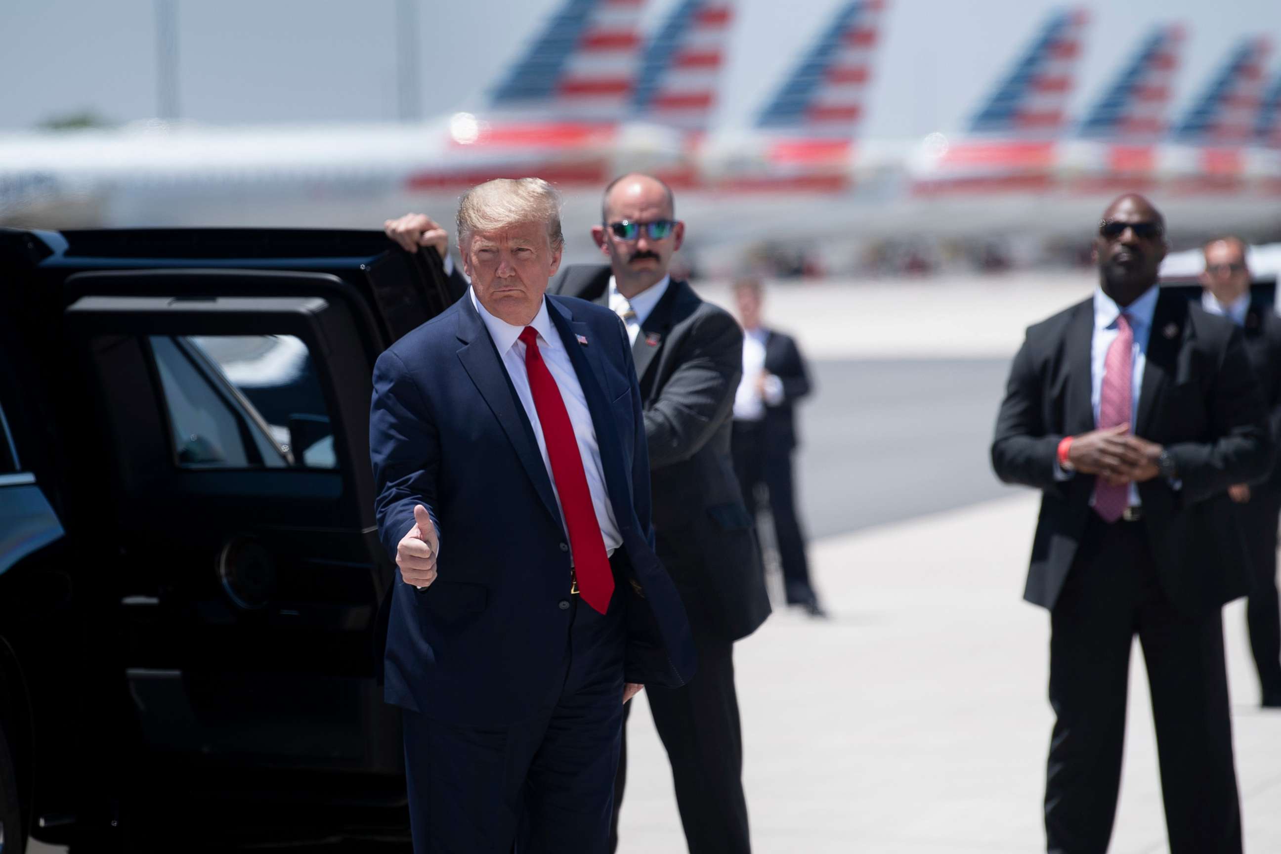PHOTO: President Donald Trump arrives at Phoenix Sky Harbor Airport during his first trip since widespread COVID-19 related lockdowns went into effect, May 5, 2020, in Phoenix.