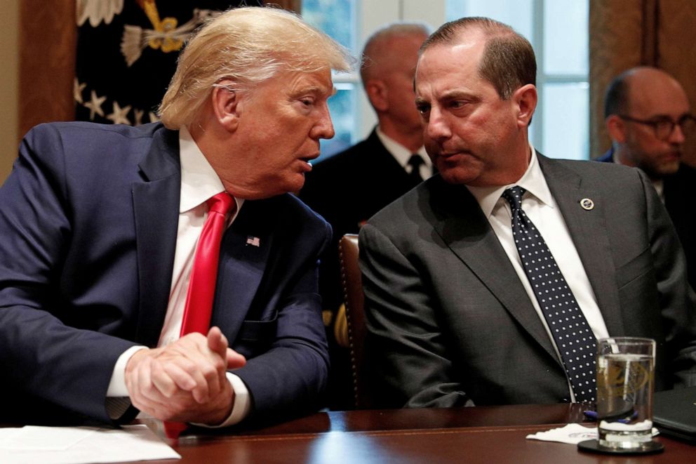 PHOTO: President Donald Trump speaks to Health and Human Services Secretary Alex Azar during a listening session on youth vaping and the electronic cigarette epidemic inside the Cabinet Room at the White House in Washington, Nov. 22, 2019.