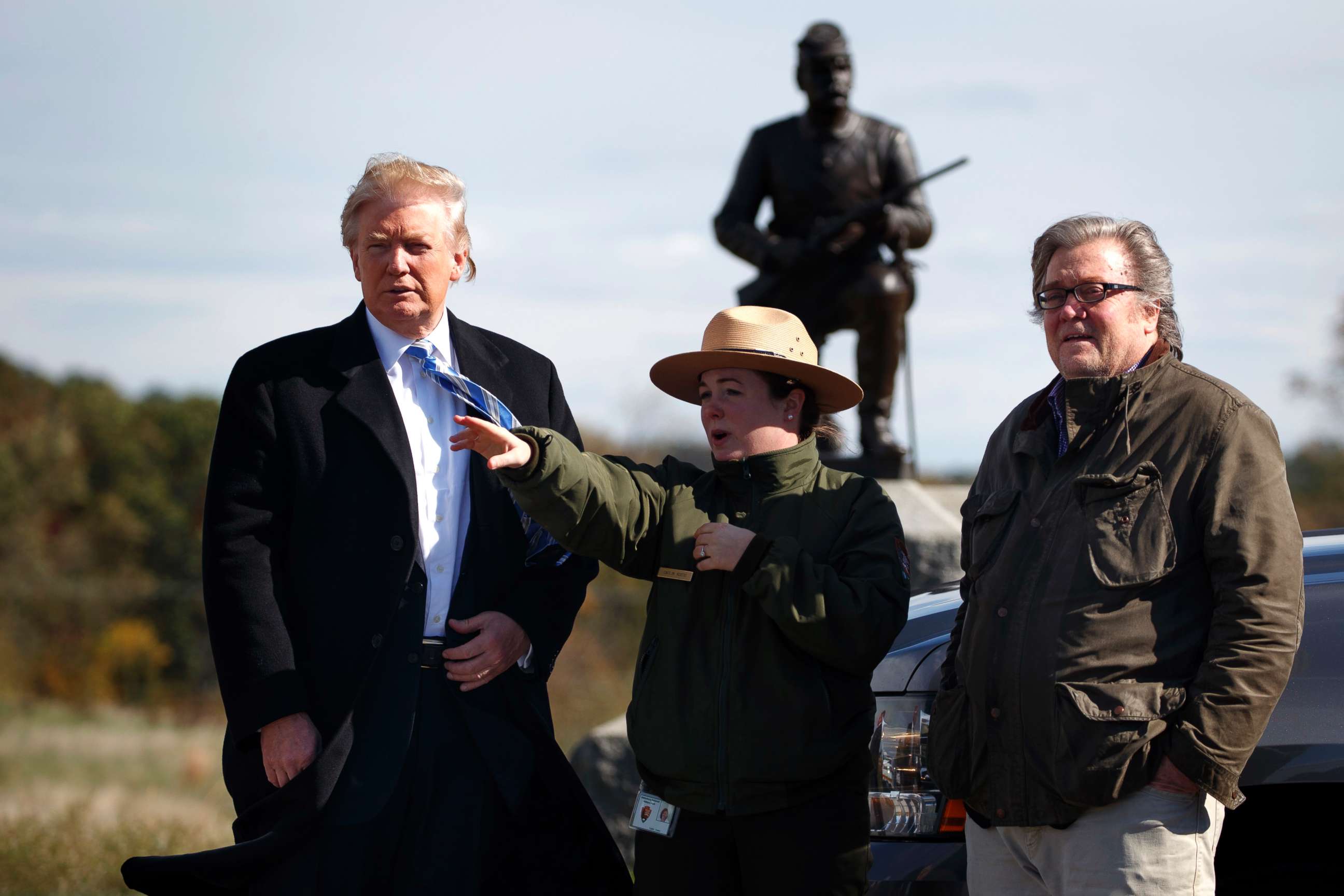 PHOTO: Park ranger Caitlin Kostic gives a tour near the high-water mark of the Confederacy at Gettysburg National Military Park to Republican presidential candidate Donald Trump, left, and campaign CEO Steve Bannon, Oct. 22, 2016, in Gettysburg, Pa.