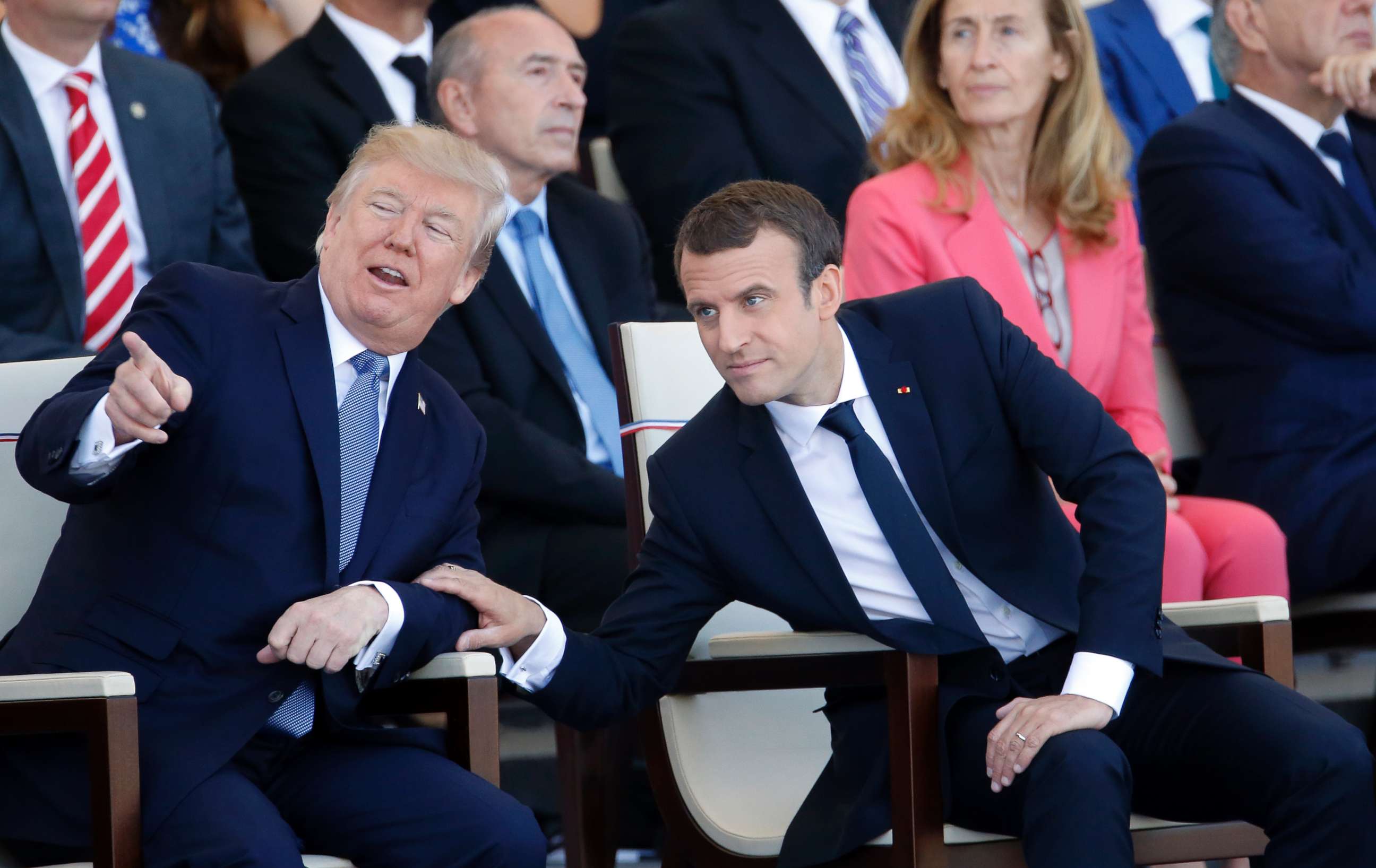 PHOTO: President Donald Trump and French President Emmanuel Macron attend the traditional Bastille day military parade on the Champs-Elysees on July 14, 2017 in Paris.