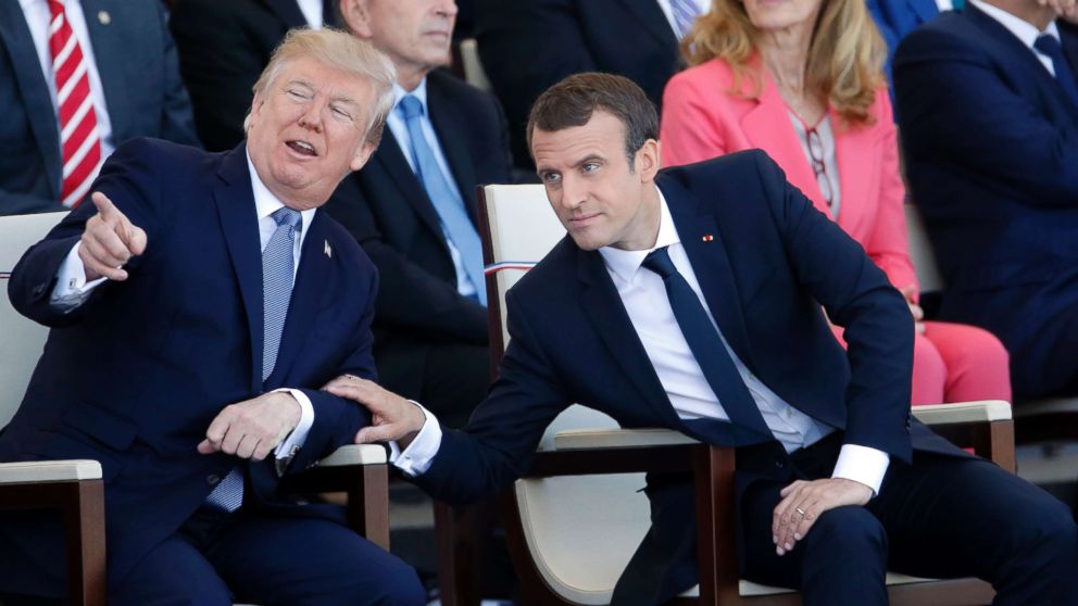 PHOTO: President Donald Trump and French President Emmanuel Macron attend the traditional Bastille day military parade on the Champs-Elysees on July 14, 2017 in Paris.