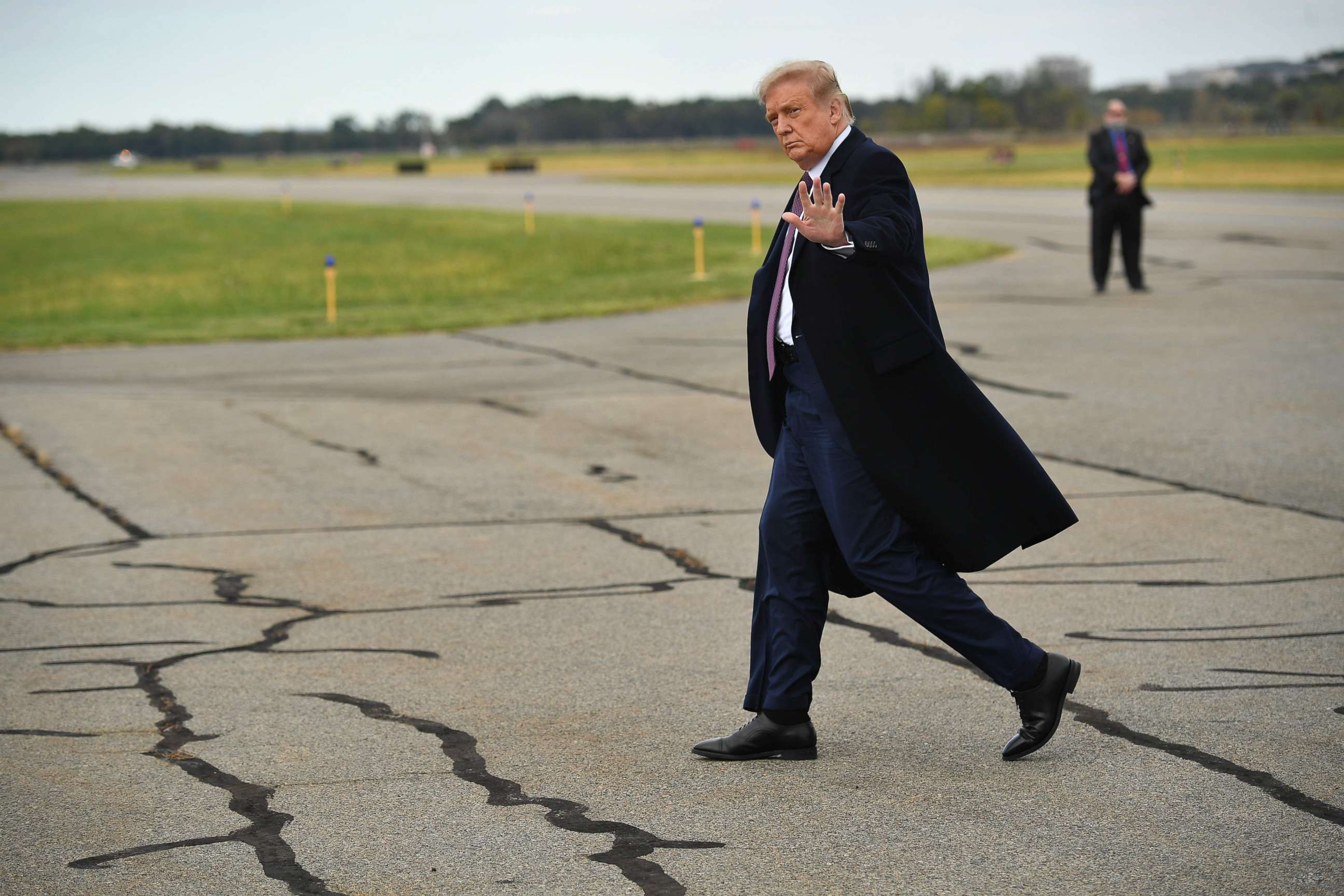 PHOTO: President Donald Trump steps off Air Force One upon arrival at Morristown Municipal Airport in Morristown, N.J., en route to Bedminster, N.J., on Oct. 1, 2020, for a fundraiser.