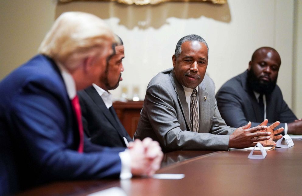PHOTO: President Donald Trump listens to Secretary of Housing and Urban Development Ben Carson as he meets with Carson and other conservative black supporters in the Cabinet Room at the White House in Washington, June 10, 2020.